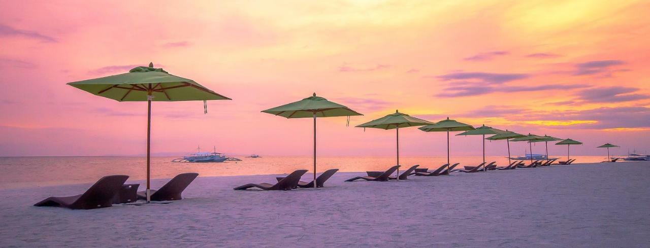 Oceanica Resort Panglao, Bohol Eksteriør billede Sunset at the beach